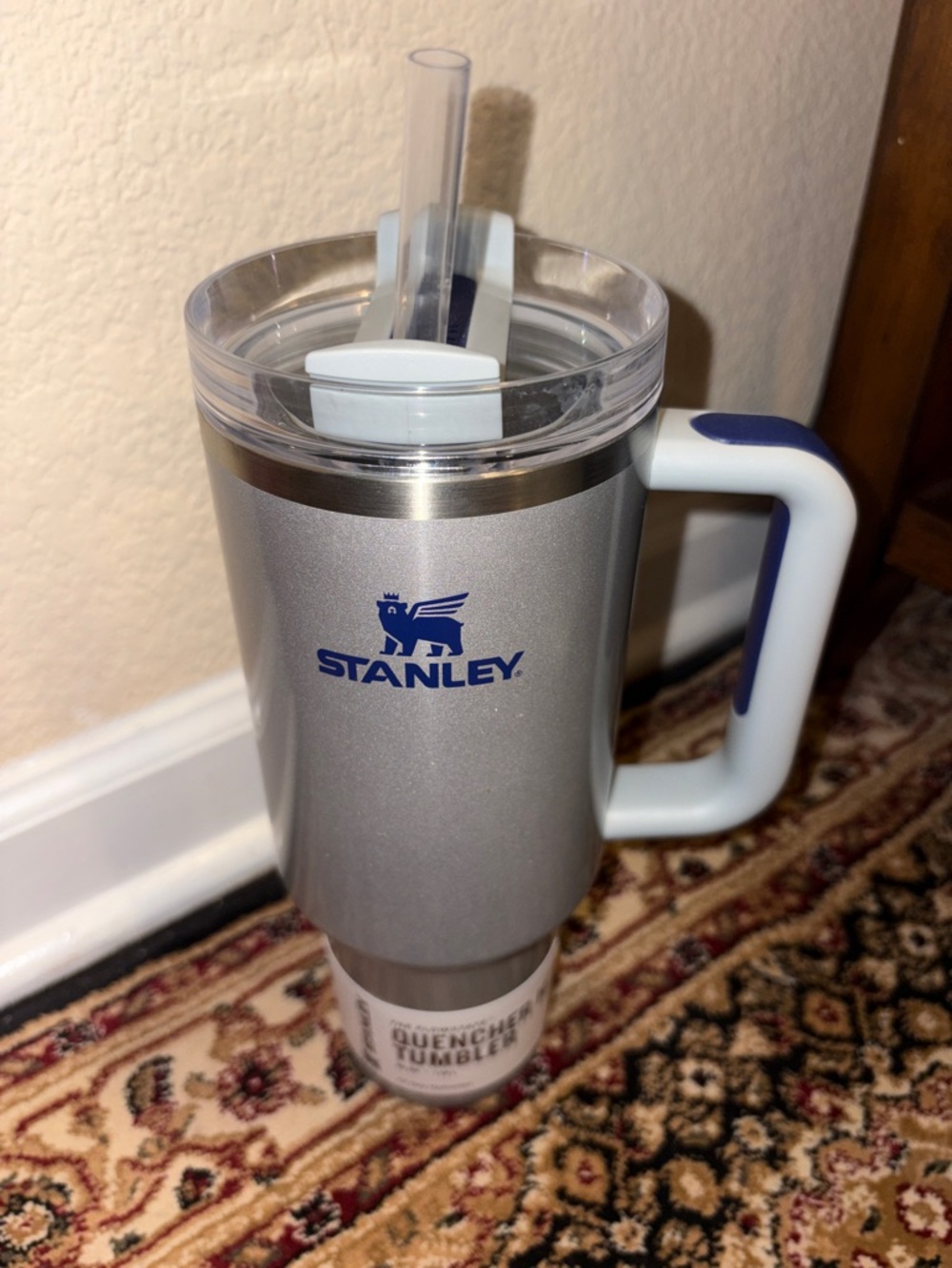 Stanley Tumbler Silver with blue accents.